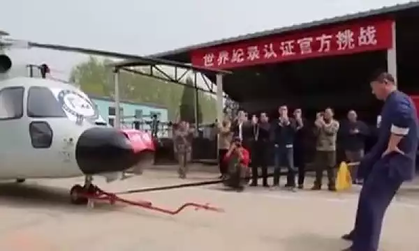 Kung Fu Master Sets New World Record After Using His Manh00d To Pull An Helicopter 